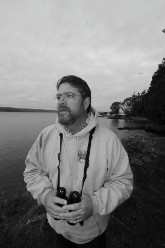 John Farnsworth birding near his home in the San Juan Islands.
