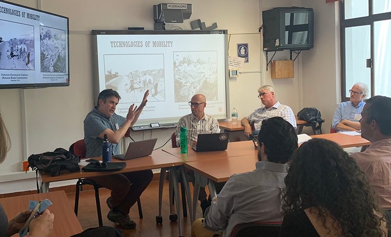 Panel titled Marketing and Capitalism in Latin America and Its Impact in Rural and Urban Spaces. Mateo J. Carrillo at far left.