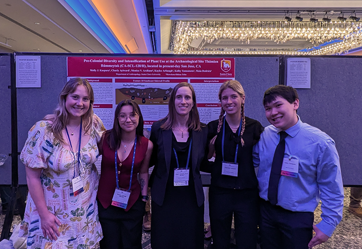 Female students and faculty in front of their poster presented at the Society for American Archaeology Annual Meeting