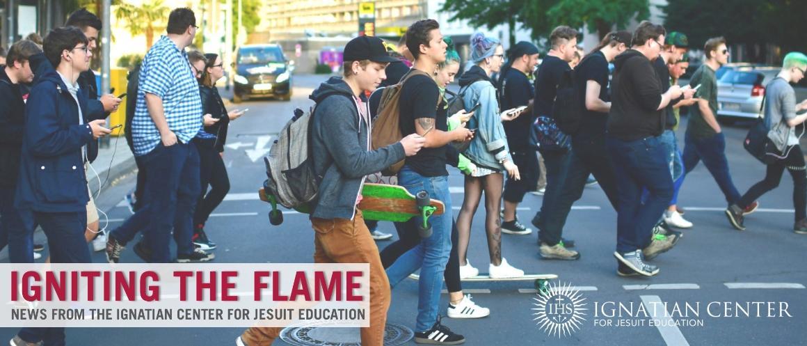 people walking while looking at phones