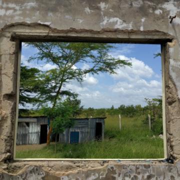 Africa scene through old building