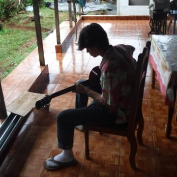 Boy playing guitar