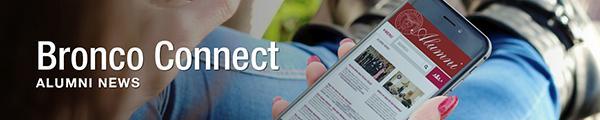 Close up of person looking at SCU Alumni website on a mobile phone.