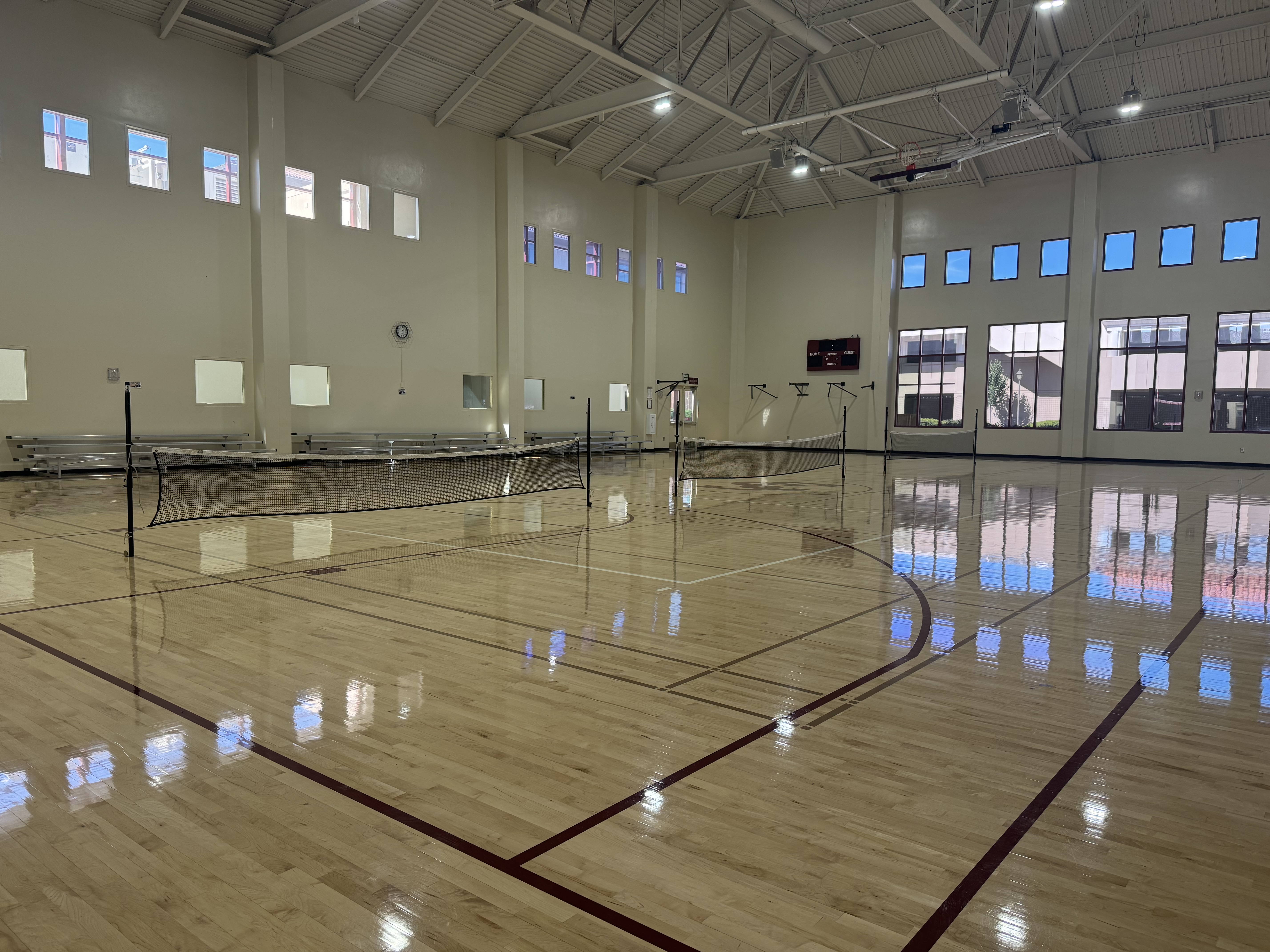 The pickleball nets set up on the indoor court
