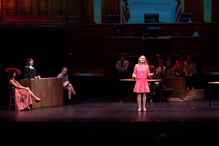 A theatrical scene from Legally Blonde with actors performing.