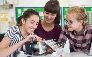 Girls working on science project