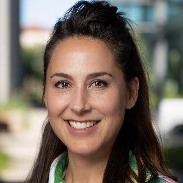 Portrait of SCU ethnomusicologist Christina Zanfagna, a white woman with dark hair.