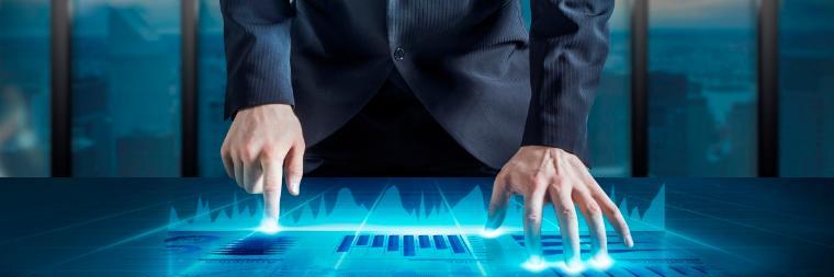 A person interacting with a digital interface on a touchscreen table.