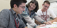 Professor helping students